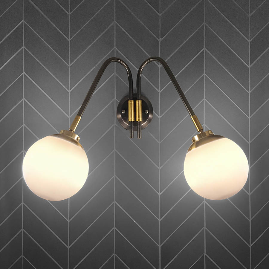 Thompson Wall Sconce - Blackened steel wall fixture with white glass globes